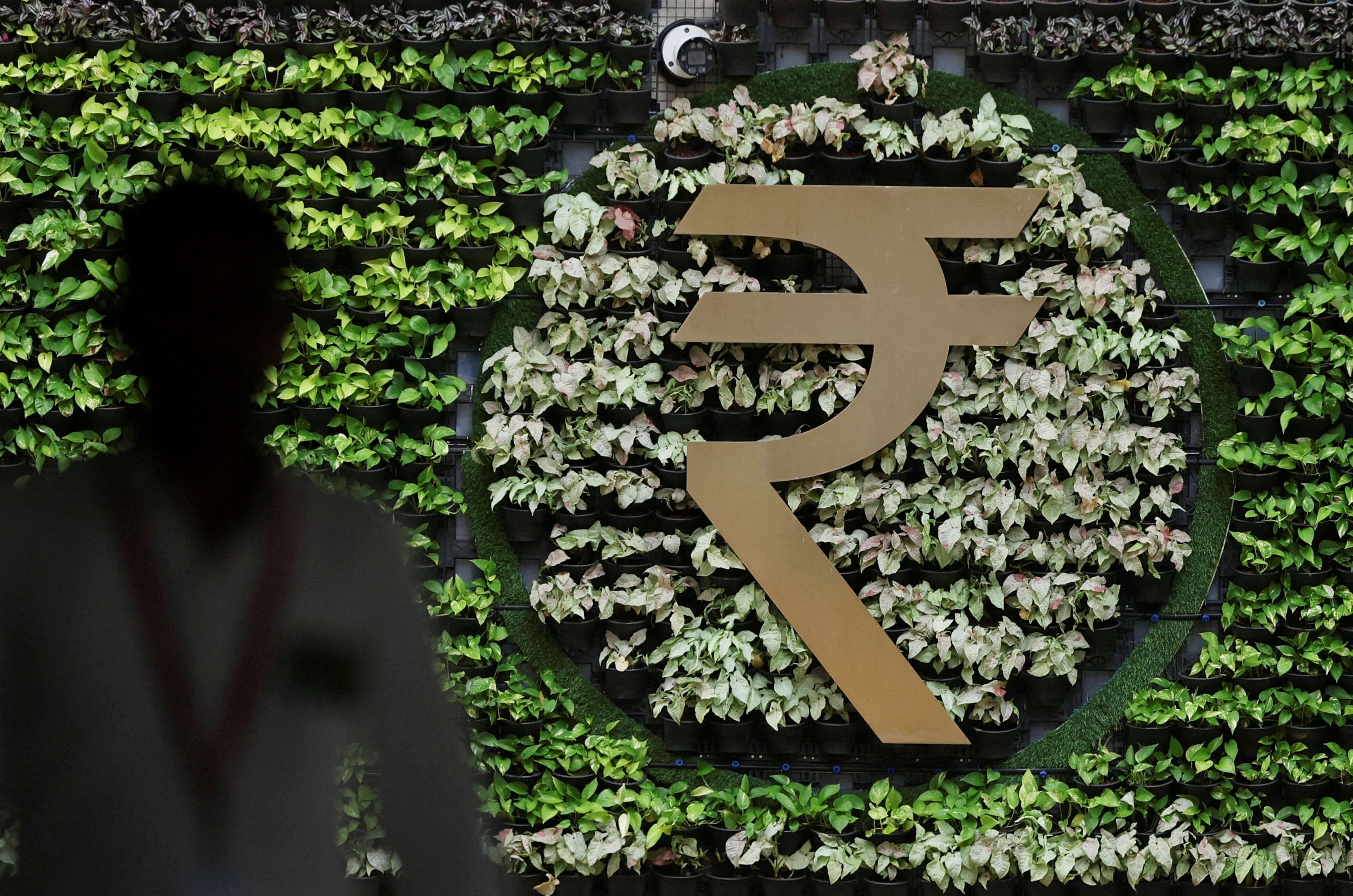 Rupee declines to one-week low as oil rally fans global rate hike worries